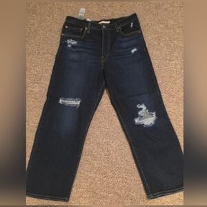 Women's Distressed Blue Levi Jeans